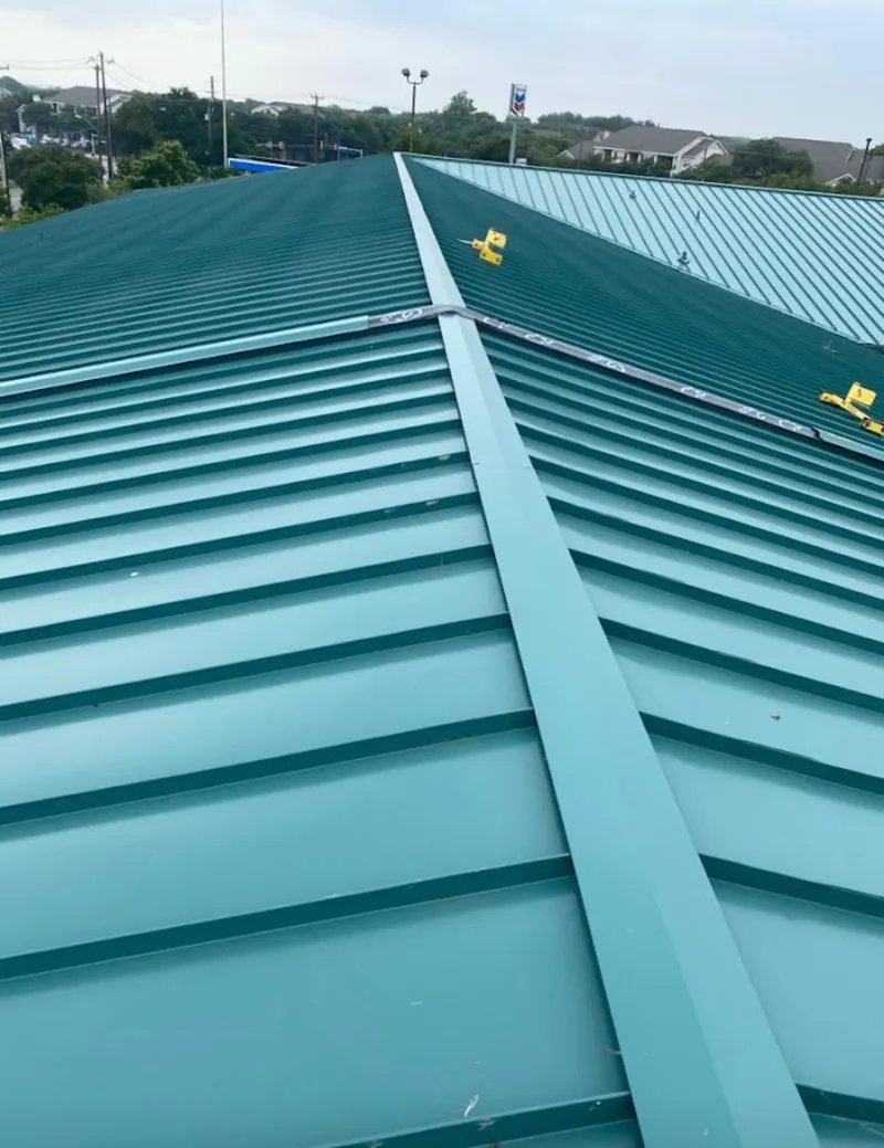 Green commercial metal roof ridge and valley for Metal Roof Repair in Lacy-Lakeview